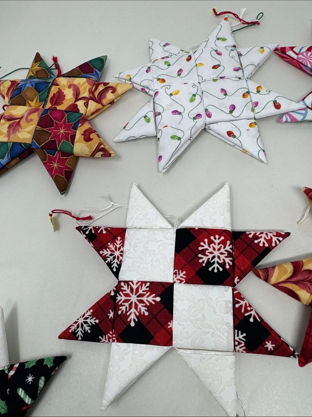 HANDMADE FOLDED FABRIC FOLDED STARS CHRISTMAS ORNAMENTS QUILT LOT OF 11 BOHO